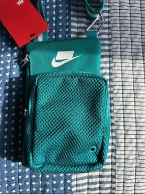 Nike sports bag in teal and white . NWT.